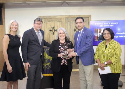 Camden County Chief Magistrate Judge Jennifer Lewis, center, accepts the Golden Eagle Award on Thursday, May 14 at the Santa Maria Venue in St. Marys. The Golden Eagle award is presented each year by the Scouting America Coastal Council to a person who has contributed immensely to the scouting organization’s mission and goals. With Lewis, from left, are Alison Shores, Anthony Kicklighter, CB Yadav and Sugar Yadav. To view more photos, see Page 15 and visit tribune-georgian.smugmug.com.