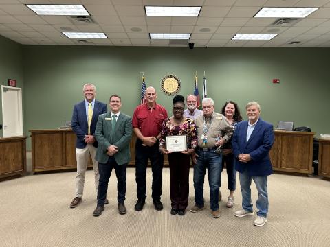 Frankie Hillery-Miller, center, was recently honored as the Camden County Board of Commissioners’ Employee of the Quarter. With Hillery-Miller are, from left, Interim County Administrator Joey Yacobacci, Commissioners Cody Smith and Ben Casey, Chairman Robbie Cheek, Commissioner Jim Goodman, Interim Deputy County Administrator Shannon Nettles and Commissioner Martin Turner 