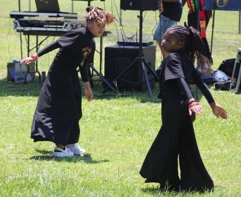 Jhianna Patterson and Autumn Fizer dance Saturday during the annual Juneteenth Jubilee in Woodbine. The celebration is hosted each year by the Camden County NAACP branch. To view more photos from the event, visit tribune-georgian.smugmug.com/Juneteenth-Jubilee-2026.