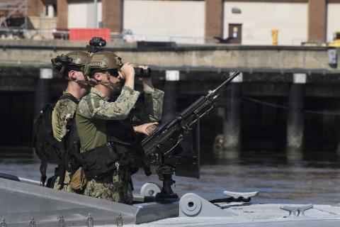U.S. Service members assigned to Marine Corps Security Force Battalion Kings Bay (MCSFBn) maintain watch at Naval Submarine Base Kings Bay. MCSFBn partners with Strategic Weapons Facility Atlantic (SWFLANT) to provide continuous, overlapping land and water security, safeguarding the sea-based leg of the nation’s nuclear triad. (U.S. Navy)