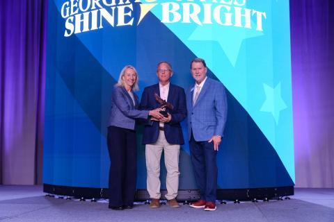 Camden County’s William “Bill” Gross, center, was recently honored with the Georgia Cities Foundation Renaissance Award at the Georgia Municipal Association’s Annual Convention in Savannah.