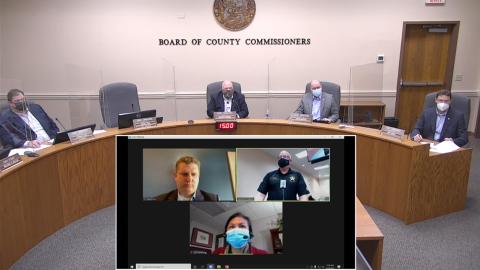 Nassau County commissioners, including Aaron Bell via the Internet, listen to Nassau County Emergency Management Director Greg Foster provide an update on COVID-19 and vaccinations.