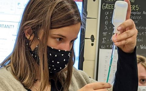 Fernandina Beach High School student Sarah Perkins uses a pipette to collect water for analyzing. Fernandina Beach High School students prepare biological slides that are ready to be put in the incubator overnight. KENDRA SHAFER/FOR THE NEWS-LEADER