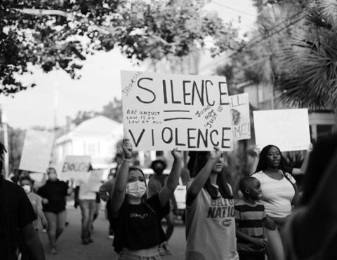 Protestors during a march earlier this month in Fernandina Beach. KATHRYN BYNUM/SPECIAL