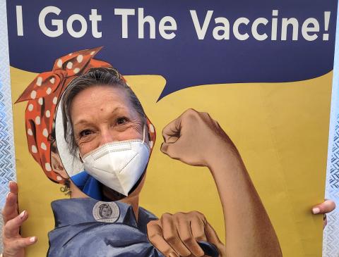 Marilyn Bailey celebrates receiving the COVID-19 vaccine at The Lakeside at Amelia Island.