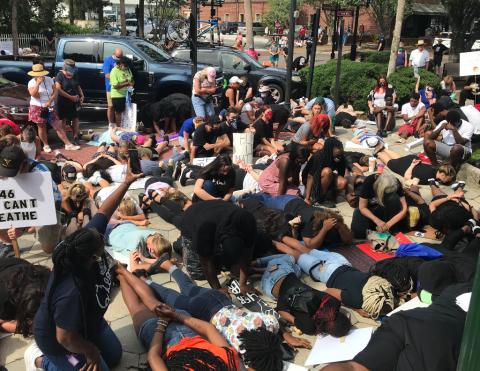 In a gesture of solidarity, protesters took a knee, observed silence or laid on the ground in the same position as George Floyd for eight minutes and 46 seconds, the length of time a Minneapolis police officer knelt on Floyd’s neck while other officers and bystanders watched. MIKE LEARY/SPECIAL FOR THE NEWS-LEADER