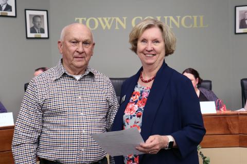 Take Stock in Children Mentor Trainer Dotti Williams receives a proclamation from Hilliard Mayor Floyd Vanzant.