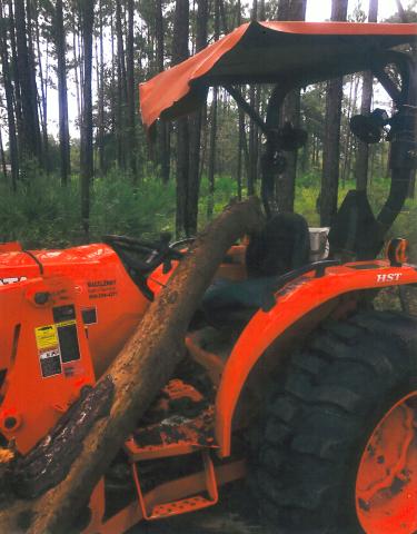 Callahan’s Bill Quaile had a scare recently when a tree fell on his front-end loader, injuring his right arm.