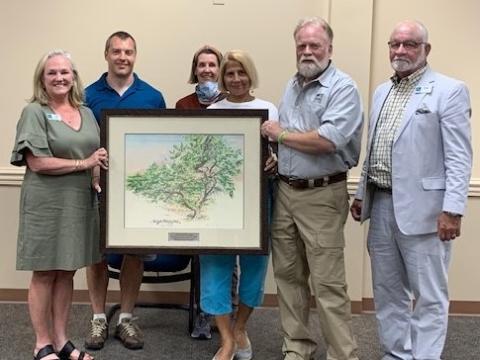 Keep Nassau Beautiful was recently honored by the Florida Urban Forestry Council’s Friends of Our Urban Forest Awards. From left are Keep Nassau Beautiful Executive Director Lynda Bell, Keep Nassau Beautiful Chadd Scott, Kelley McCarter and Margo Story, Florida Urban Forest Council President and Keep Nassau Beautiful member Mike Cole.