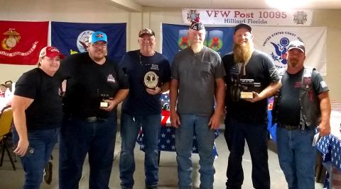 The Blank Check Society’s Fifth Annual Pork Butt Cook-Off judges are Judge Steve Fahlgren, Dennis Morris and Sheriff Bill Leeper. The BCS wrote a $7,900 check to Wreaths Across America to assist in placing wreaths on graves at Jacksonville National Cemetery.