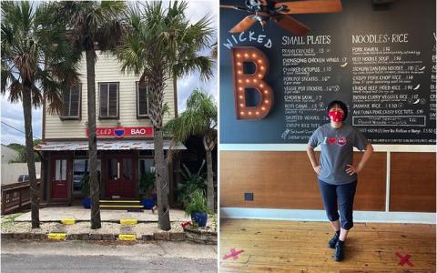The front of the Wicked Bao building, which has a colorful past. Natalie Wu poses in front of her blackboard menu. DILLON BASSE/FOR THE NEWS-LEADER