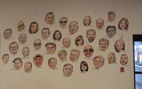 Caricatures of well-known local residents painted by Daisy Fensik adorn the walls of the Boat House, an homage to the restaurant’s Fernandina Beach roots. JULIA ROBERTS/NEWS-LEADER