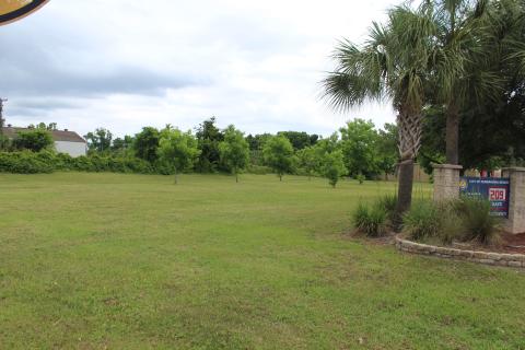 City Commissioner Bradley Bean wants to use this vacant lot on the corner of Lime and Eighth streets to create a community garden and tree nursery. He said the only cost involved would be “a little PVC pipe” for irrigation, and that as publicly-owned property, it is fitting it is used by the community.
