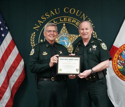 Roy Henderson, left, and Nassau County Sheriff Bill Leeper.