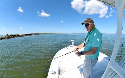 Keith Williams loves his 24-foot Yellowfin bay boat powered by a 300-hp Mercury V-8 outboard. The step hull allows for better fuel efficiency and speedy navigation to his fishing holes. TERRY LACOSS/FOR THE NEWS-LEADER