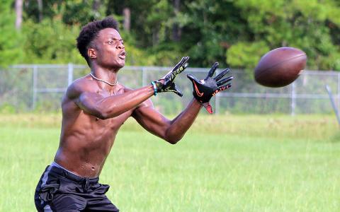 The Hornet football team practiced Tuesday morning for the upcoming season, which is still up in the air. BETH JONES/NEWS-LEADER
