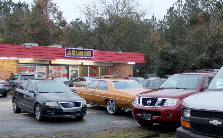 Vehicles fill the parking lot at Arcade Gaming Center in Callahan just after 5 p.m. Friday, also parking in the grass near the traffic lanes of U.S. 1. Adult arcades in Nassau County have nearly doubled in number of establishments since they were shut down in Duval County in October.