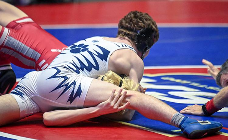 Camden County's Riley Dahlgren pinned Lowndes' Ethan McCullough for the Class 7A 120-pound title. (Submitted photo by Amber Cloy Photography)
