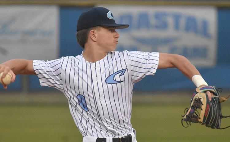 Talon Daignualt fires to first base last Friday. (Andy Diffenderfer/Tribune & Georgian)