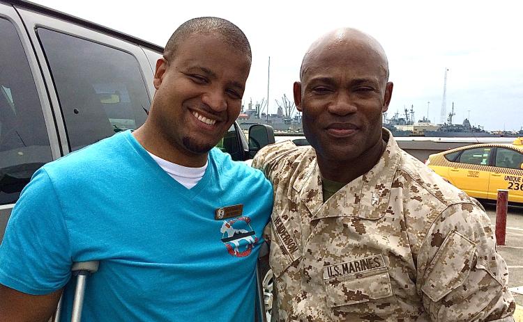 Sergio Rodriguez (left), the Armed Forces Insurance Military Spouse of the Year finalist is pictured with Marine Col. Anthony M. Henderson.