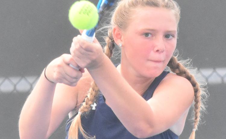 Ashlie Aldridge smacks a backhand in Camden County’s first-round playoff. (Andy Diffenderfer/Tribune & Georgian)