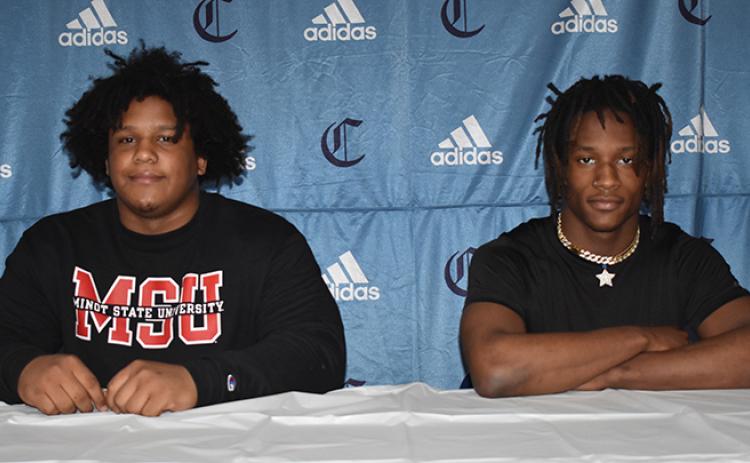 CCHS wrestlers Anthony Yancey (left) and Cah'Mari Johnson have signed with Minot State. (Andy Diffenderfer/Tribune & Georgian)