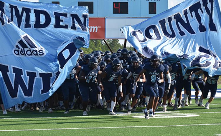 The Wildcats take the field for their Monday scrimmage with Munroe Day. (Andy Diffenderfer, Tribune & Georgian)