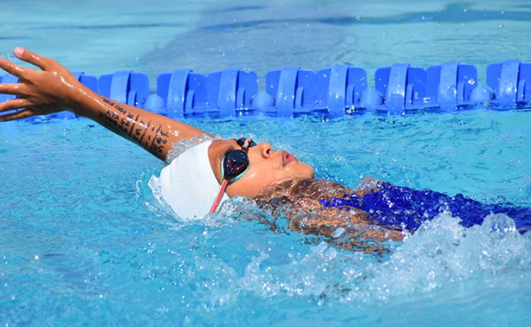 The Camden PSA Stingrays’ Logan Tacbas won the 100 individual medley Monday at a home meet. (Andy Diffenderfer/Tribune & Georgian)