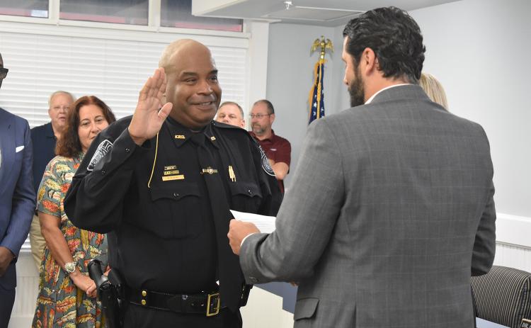 Kingsland Police Chief Rickey Evans is sworn in Monday.