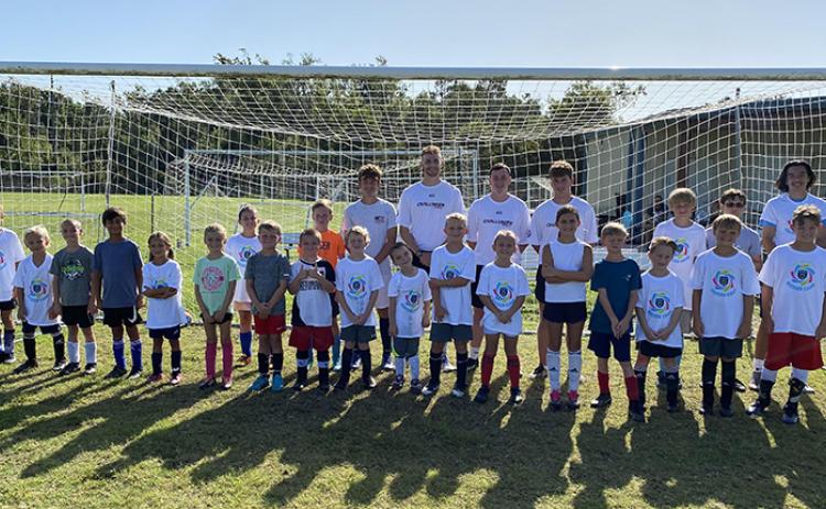 The Camden Soccer Club hosted coaches Daniel Doherty, Harry Summerill and Owen Jury for the Challenger British Soccer Camp last week at the Camden PSA Soccer Complex. (Submitted photo)