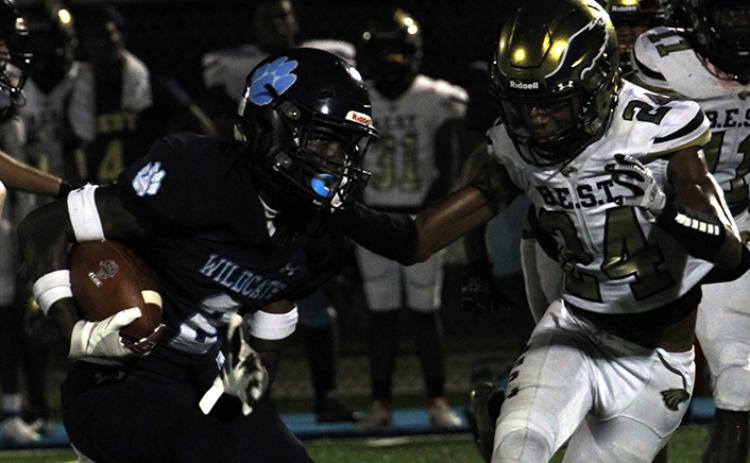Ja'Marley Riddle gains some of Camden County's 247 rushing yards last Friday. (Andy Diffenderfer, Tribune & Georgian)