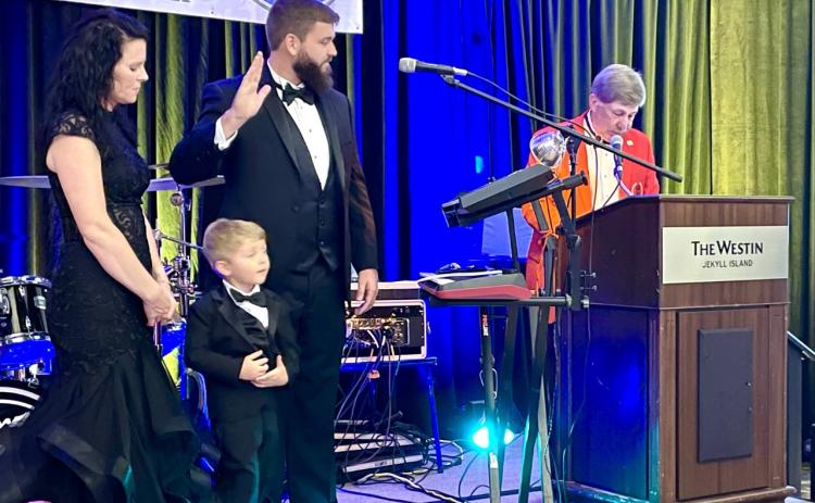 Camden County Commissioner and Readdick Construction CEO Trevor Readdick was recently named president of the Home Builders Association of Georgia. With Readdick is his wife, Nicole Readdick, and son, Frazier.