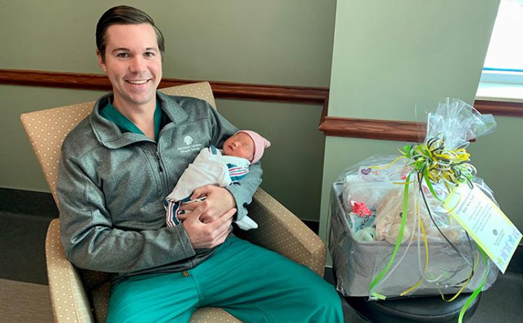 Southeast Georgia Physician Associates-Obstetrics & Gynecology’s Dr. Bradley W. Newton holds Jasper Jiang, Southeast Georgia Health System Camden Campus’ first baby of 2023.