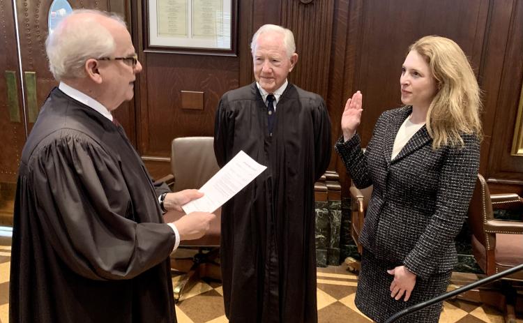 U.S. District Court Chief Judge J. Randal Hall administers the oath of office to Southern District of Georgia U.S. Attorney Jill E. Steinberg on Feb. 22 in the Federal Courthouse in Augusta, observed by U.S. District Court Judge Dudley H. Bowen.