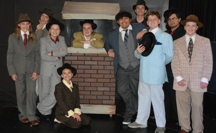 Emmry Braid, from left, Alex Higginbotham, Desiree Williams, Madeline Gillespie, Eliza Sears, Jayson McLaughlin, Nathan Hauenstein, Elijah Kessler, Dylan Carter and Isabelle Crenshaw will perform in Saltwater Performing Arts’ “Guys and Dolls” at The Warehouse in Kingsland.