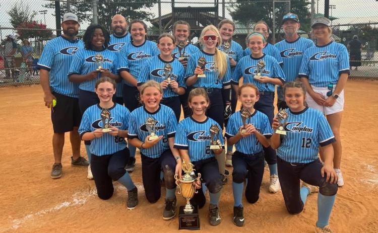 The Camden County 12-year-old softball team won the Class A/B District 2 championship Monday in Waycross and qualified for the state tournament next week in Statesboro. (Submitted photo)