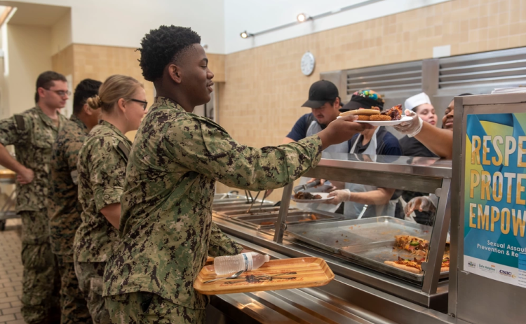 Sailors from Naval Submarine Base Kings Bay wait in line at the Pirates Cove Galley. The Kings Bay galley reopened after being closed for more than two years for renovations.