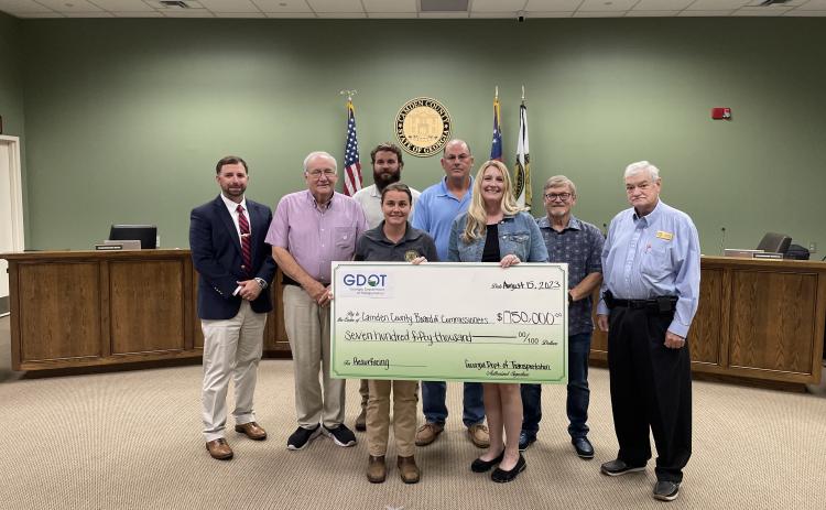 Camden County Board of Commissioners recently received $750,000 for Horse Stamp Church Road improvements. From left are County Administrator Shawn Boatright, Commissioners Lannie Brant and Trevor Readdick, Public Works Director Shalana McNamee, commission Chairman Ben Casey, Grants Manager Julie Haigler, and Commissioners Martin Turner and Jim Goodman.