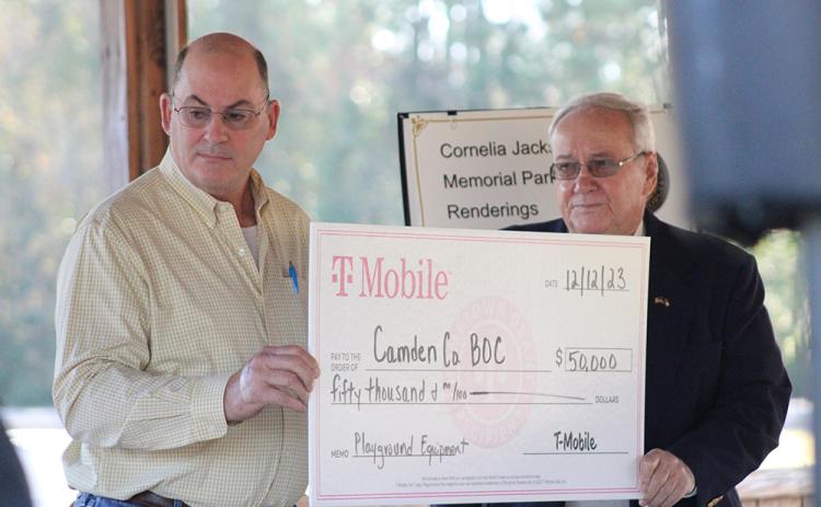 Camden County is the recipient of a $50,000 grant from a national cellphone carrier for park improvements at Cornelia Jackson Memorial Park. On Tuesday afternoon, county leaders celebrated the grant with a short ceremony at the Woodbine park. The $50,000 T-Mobile Hometown Grant will “enhance Cornelia Jackson Memorial Park by adding new playground equipment to improve community health and wellness and overall quality of life.” Later that day, county commissioners voted unanimously to accept the grant and mat