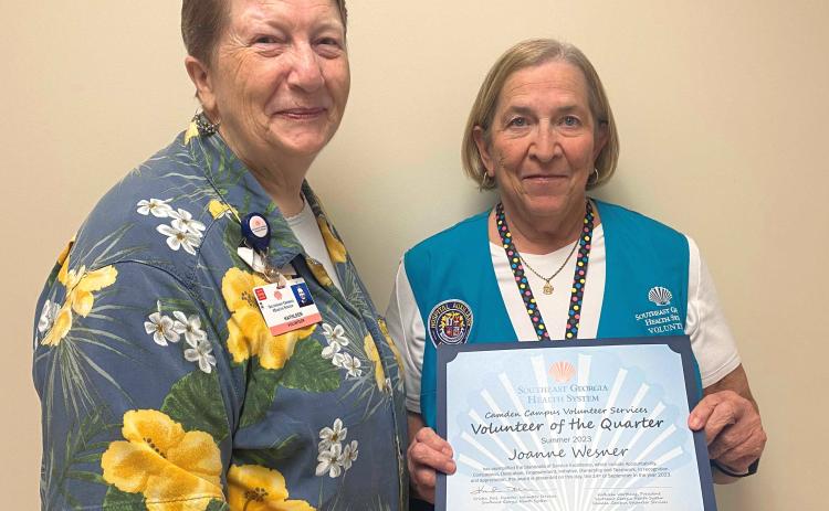 Southeast Georgia Health System Volunteer Services President Kathleen Worthing, left, presents the Summer Volunteer of the Quarter award to Joanne Wesner.
