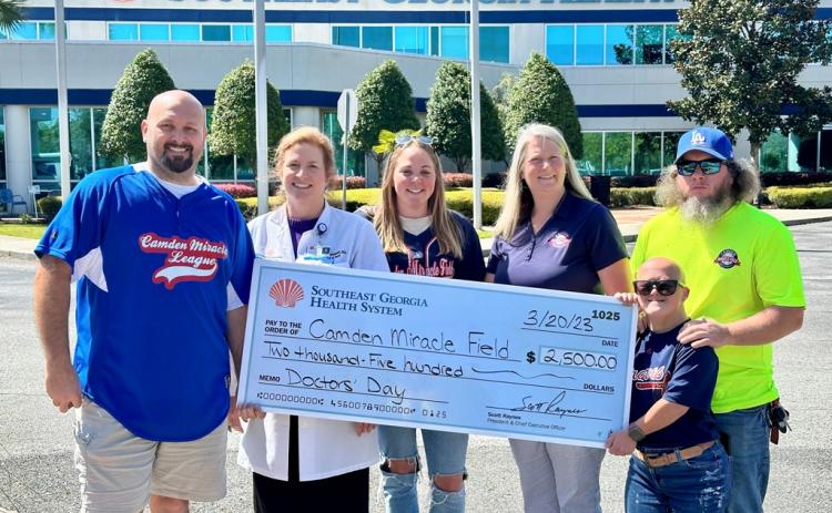 Southeast Georgia Health System recently donated $2,500 to the Camden Miracle League. From left are Camden Miracle Field board president Dillon Lacoste, Southeast Georgia Health System Camden Campus’ Dr. Janise H. Whitesell, Camden Miracle Field’s board members Nicole Ludwig and Sarah Johnsen, and Buddy Dan Fredericks and Lisse Nettles.
