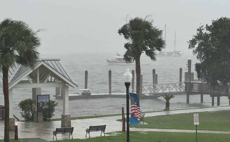 Bert Guy | Special to the Tribune & Georgian Heavy winds and driving rain pummel downtown St. Marys. The photo was taken from the balcony of the Riverview Hotel.