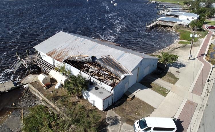 The roof of the building at Lang’s Marina received substantial damage from Hurricane Helene on Friday morning. Thousands of Camden County residents were without power through most of the weekend. (Michael Lewis Aerial Photography | For the Tribune & Georgian)