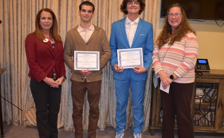 Christian Tortorici and John Clelland IV were recently honored with the Sue Gilvey Memorial Scholarship. From left are Lakes Crossing Senior Care Center Executive Director Patti McNeal, Tortorici, Clelland and LaQuita Herrin, a representative of the Gilvey family.