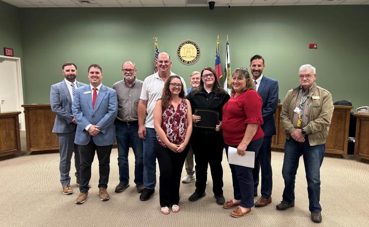 The Camden County Board of Commissioners Information Technology Department’s Kayla Oliver was recently honored as the entity’s Employee of the Quarter. From left are County Administrator Shawn Boatright, Commissioners Cody Smith and Robbie Cheek, Chairman Ben Casey, Employee Recognition Member Krystin Miller, Commissioner Martin Turner, Employee Recognition Committee Member Amy Peeples, Deputy County Administrator Seth Collins and Commissioner Jim Goodman.