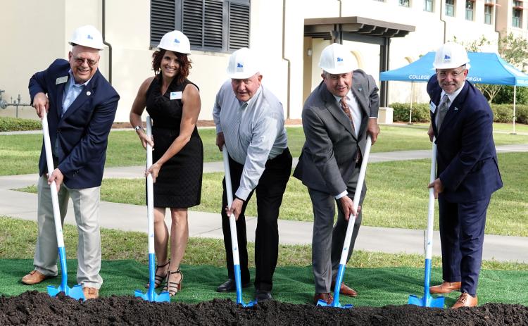 From left, state Rep. Rick Townsend, Dean of the School of Nursing and Health Sciences Lydia Watkins, University System of Georgia Chancellor Sonny Perdue, College of Coastal Georgia President Johnny L. Evans Jr. and Vice President of Advancement Jamie Bessette break ground on the expansion to Miriam and Hugh Nunnally Hall.