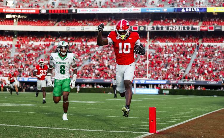 Georgia freshman Elyiss Williams races into the end zone for 23-yard touchdown reception against Marshall on Saturday. Williams, a 2025 Camden County High School graduate, was playing in his first collegiate game. The Bulldogs won 45-7. (Photo by the University of Georgia)