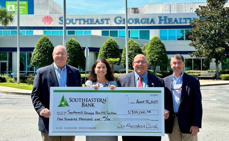 Southeastern Bank donated $100,000 to Southeast Georgia Health System Camden Campus through the Georgia HEART Hospital Program. From left are Southeastern Bank President and CEO Jay Torbert, Southeast Georgia Health System President and CEO Christy Jordan, Southeast Georgia Health System Campus Campus Vice President and Administrator Glenn Gann, and Southeastern Bank Vice President Jim Lomis.