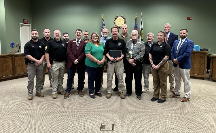 Camden County Sheriff’s Office Investigator Richard Daley, center, was named to the county’s Employee of the Quarter.