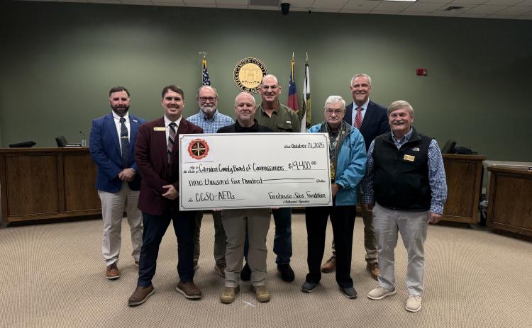 Camden County Sheriff Kevin Chaney, center, and the Camden County Board of Commissioners recently received a $9,400 grant from the Firehouse Subs Public Safety Foundation for eight Philips Onsite AEDs.